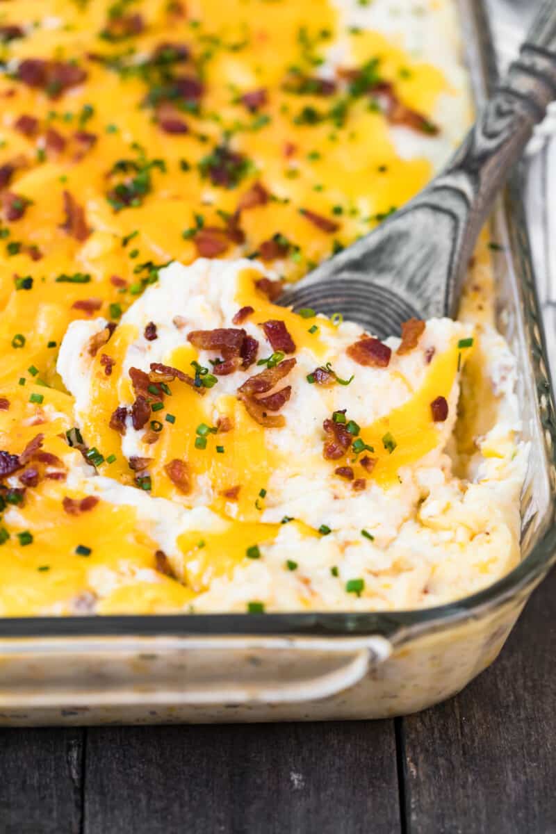baking dish with mashed potato casserole with cheese and bacon