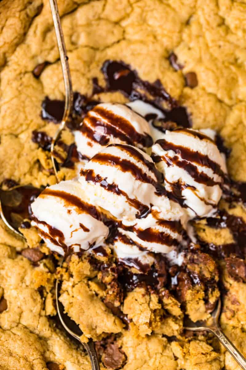 up close image of ice cream on chocolate chip cookie
