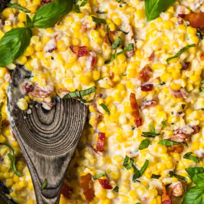 up close image of cast iron skillet creamed corn