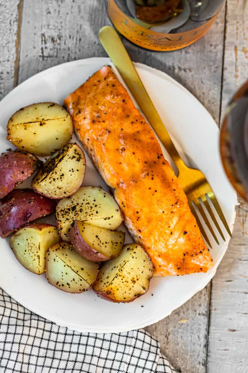 maple salmon and potatoes on white plate