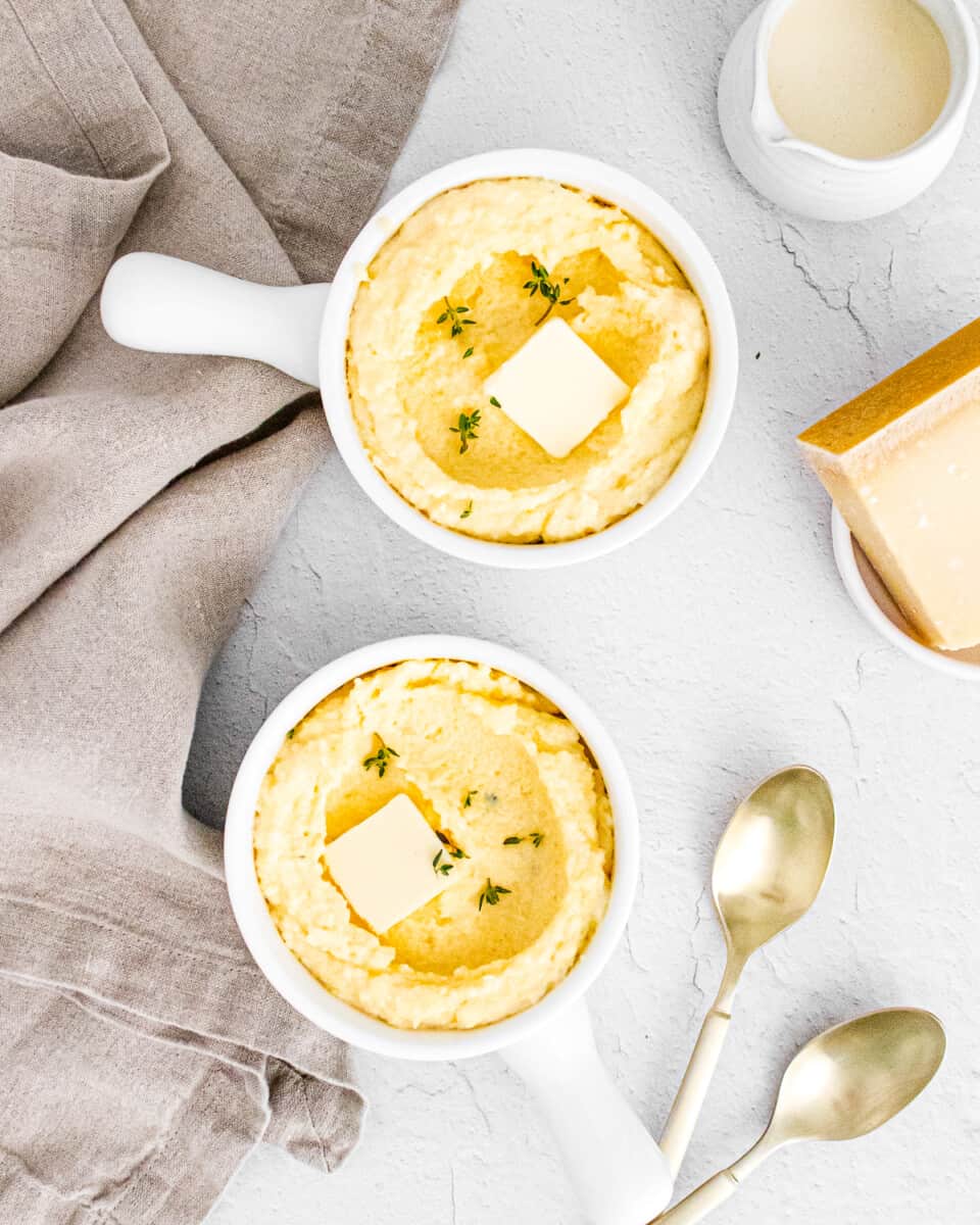 parmesan polenta in two white dishes