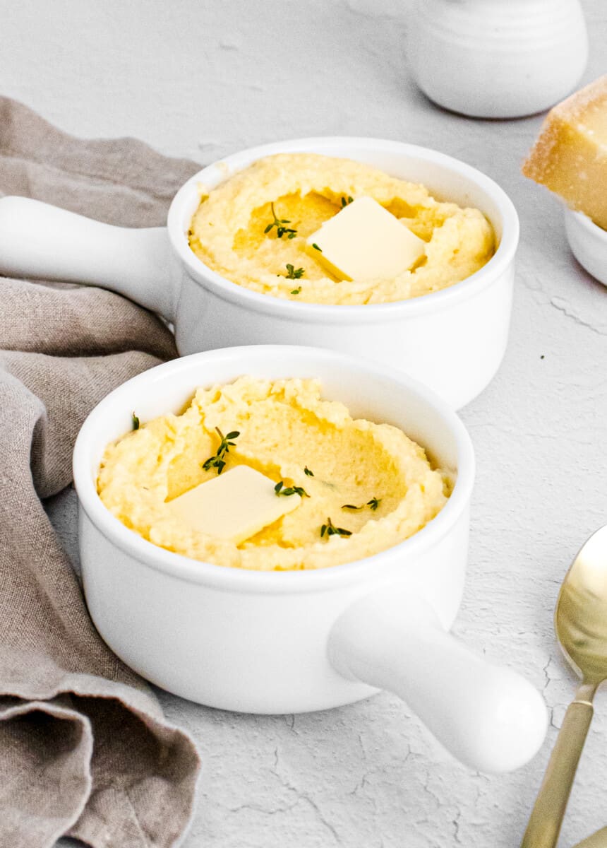 two bowls of creamy parmesan polenta