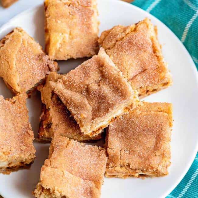 sugar cookie cheesecake bars on plate