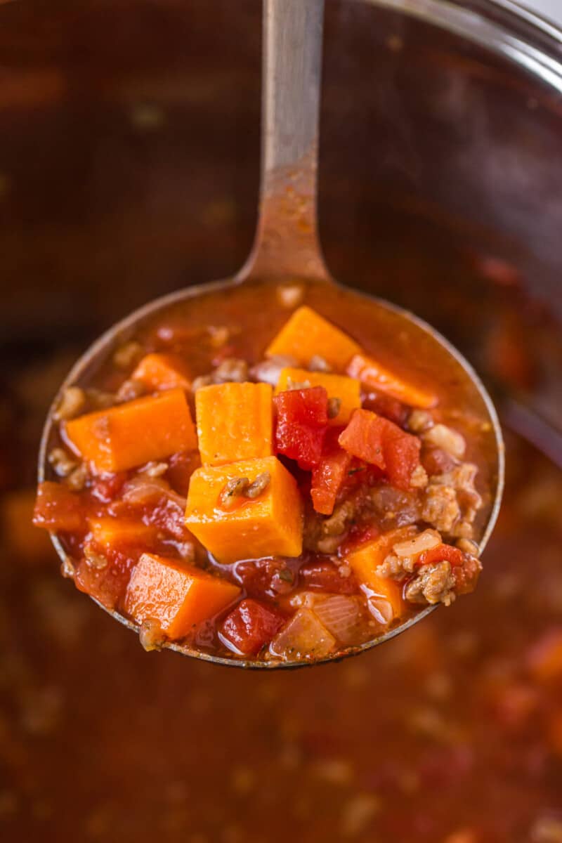 ladle with sweet potato chili