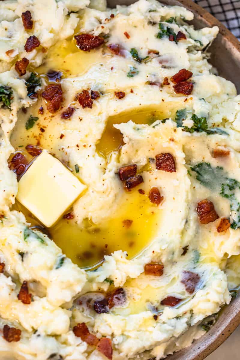 colcannon potatoes in bowl garnished with bacon