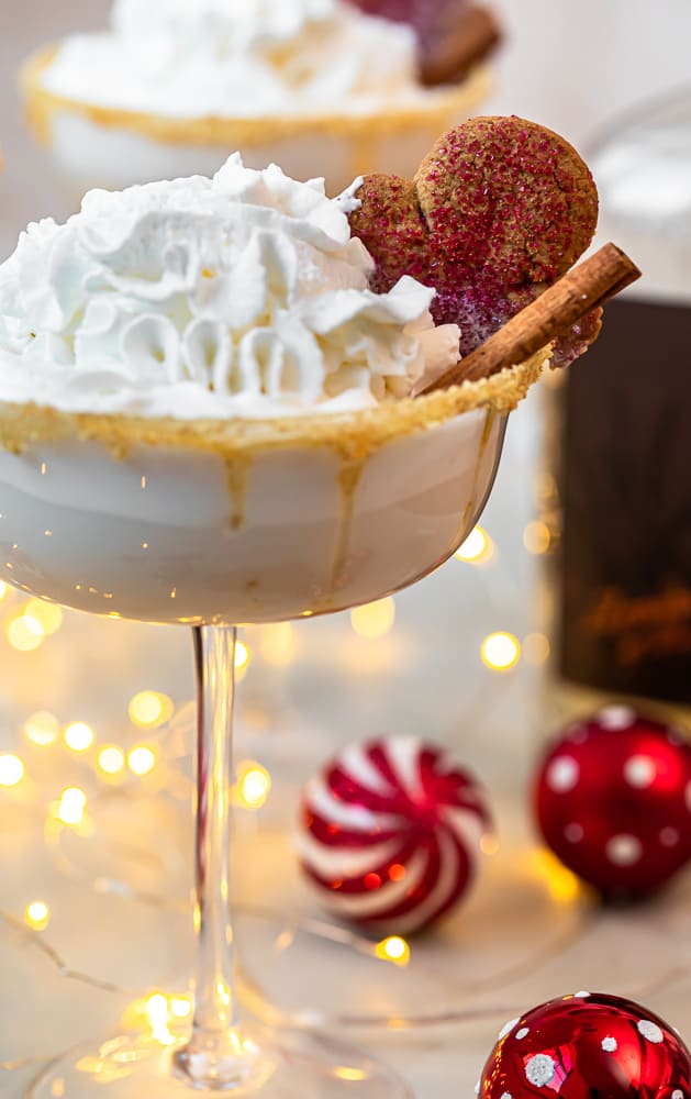 up close gingerbread martini with whipped cream and homemade ginger syrup.