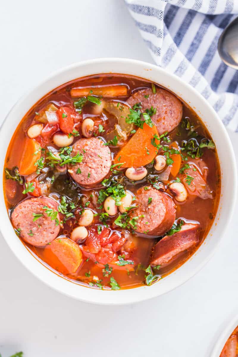 black eyed pea soup with sausage in bowl