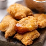 chicken nugget dipped in sauce