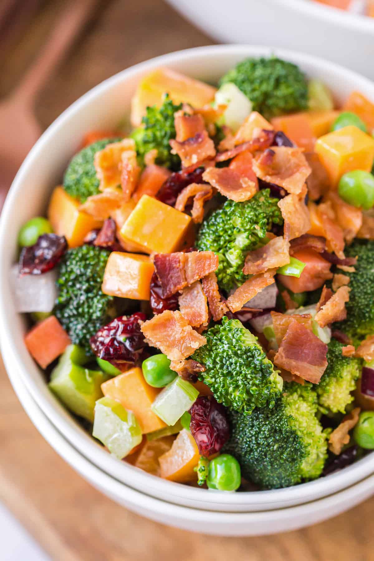 cheesy broccoli salad with bacon in bowl