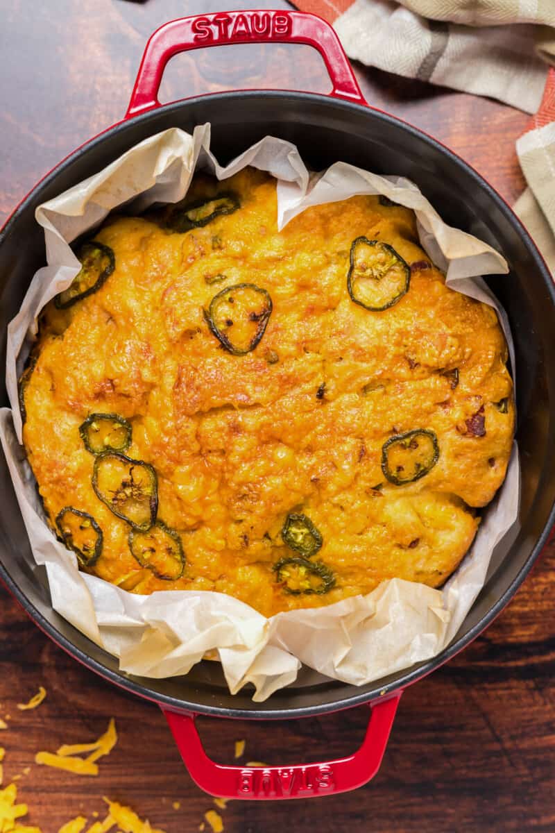 dutch oven jalapeno bread in red dutch oven