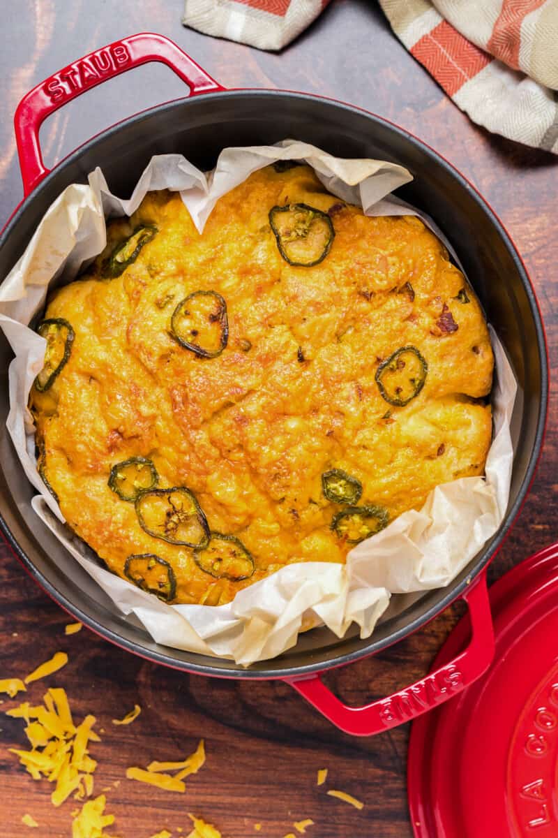 dutch oven jalapeno bread in red dutch oven