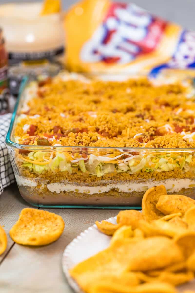 Fritos mexican layer dip in casserole dish.