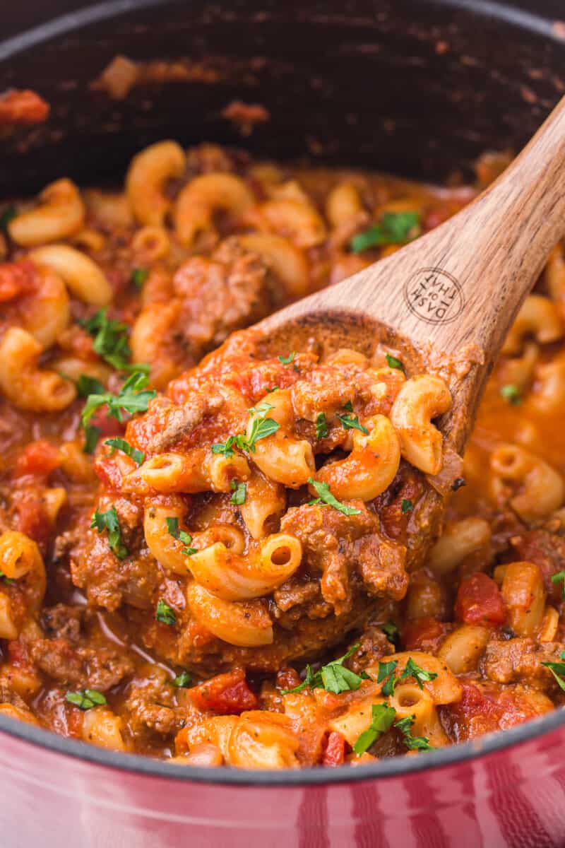 wooden spoon lifting up goulash