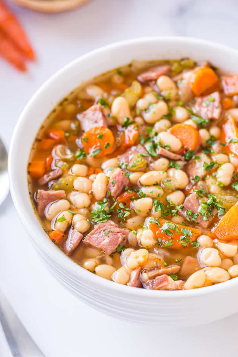 instant pot ham and bean soup in white bowl