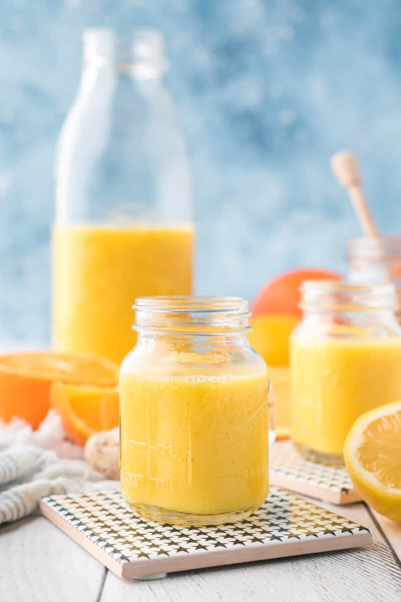 orange ginger shot on table