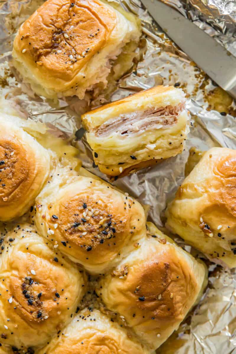 Delicious sliders recipes featuring baked ham and cheese sliders on Hawaiian rolls, perfect for parties and gatherings