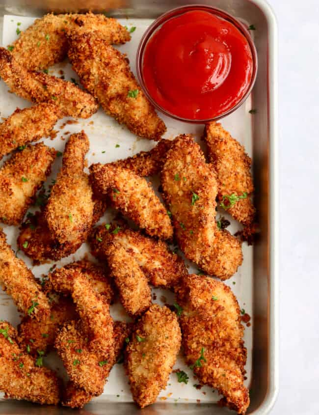 air fryer chicken tenders on baking sheet