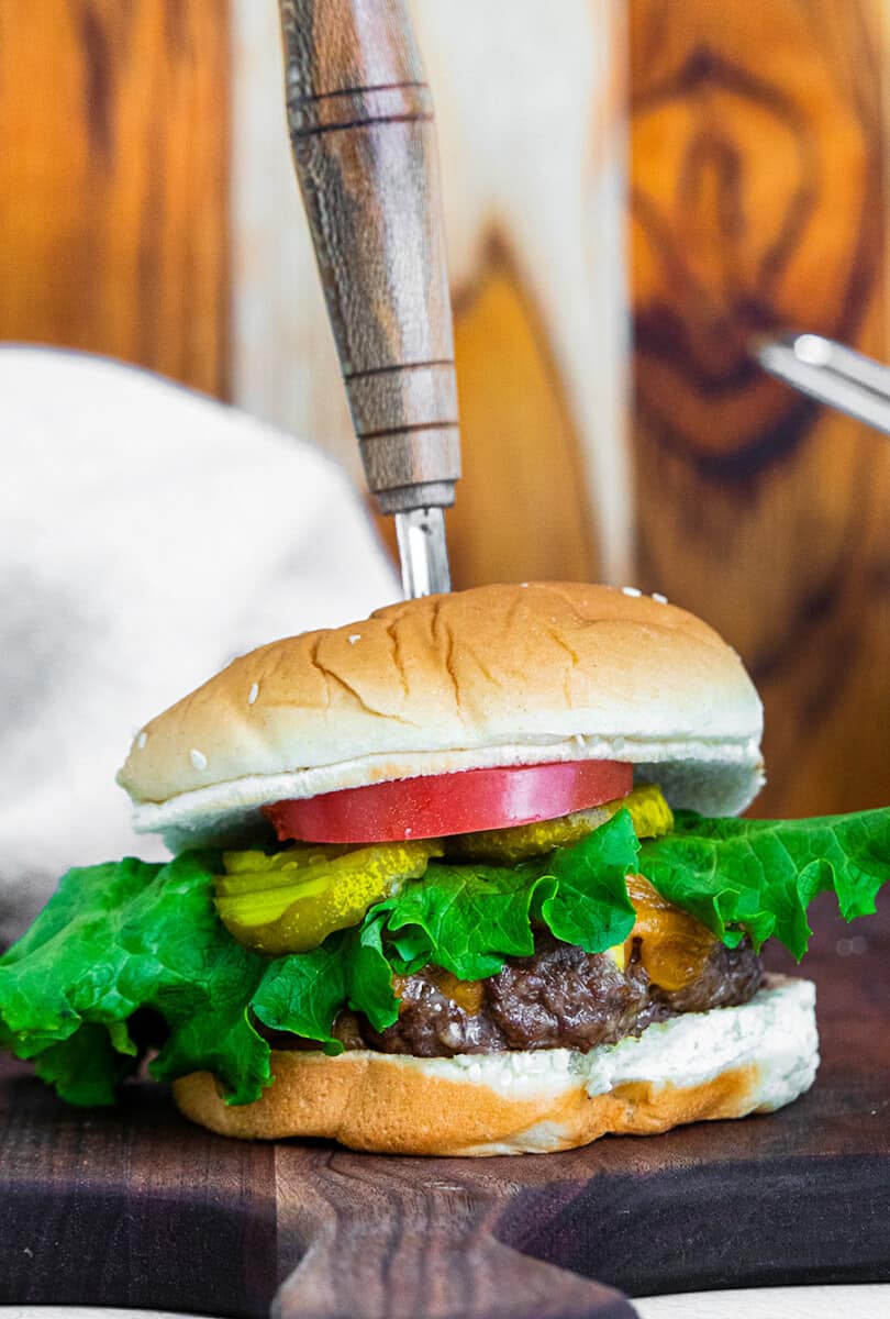 air fryer cheeseburger on butcher block