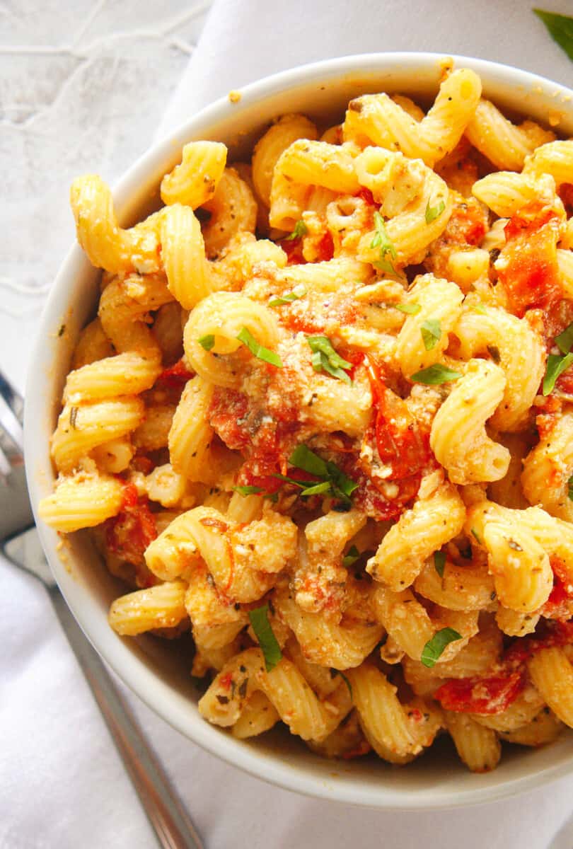 up close overhead pic of bowl of baked feta pasta