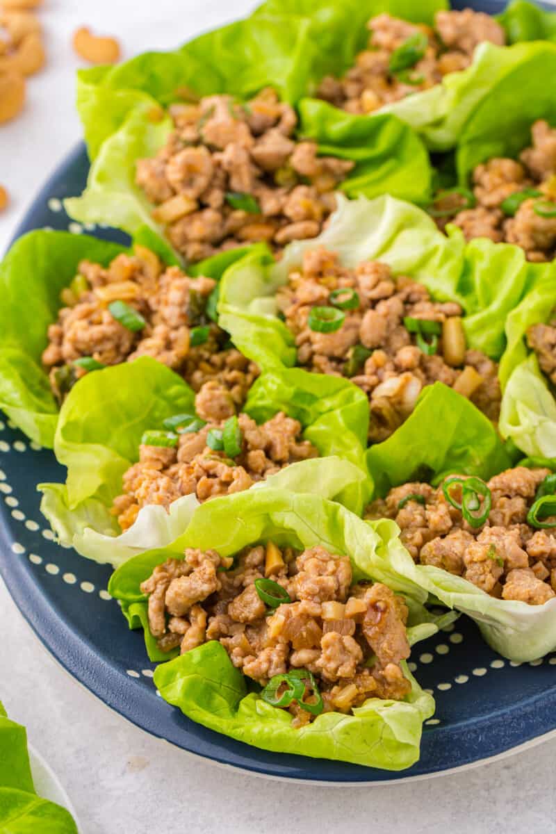 side shots of chicken lettuce wraps on platter