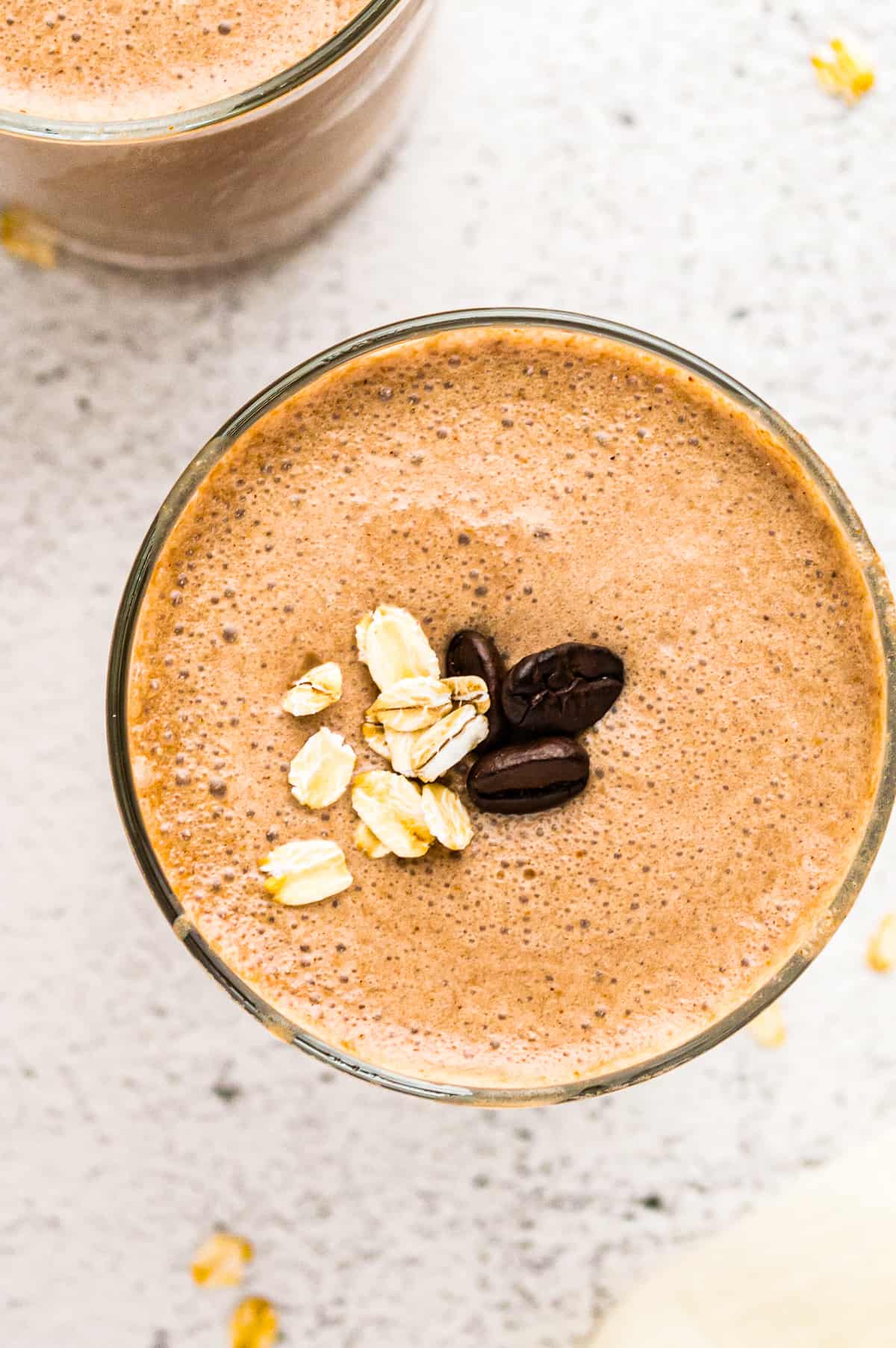 Coffee smoothie garnished with coffee beans and oats.  - 5
