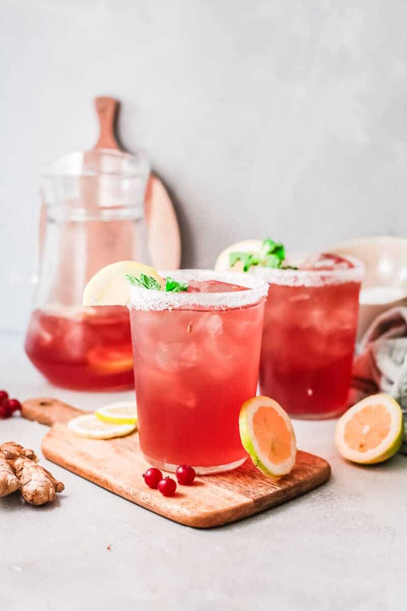 cranberry margaritas in glasses with salt rims