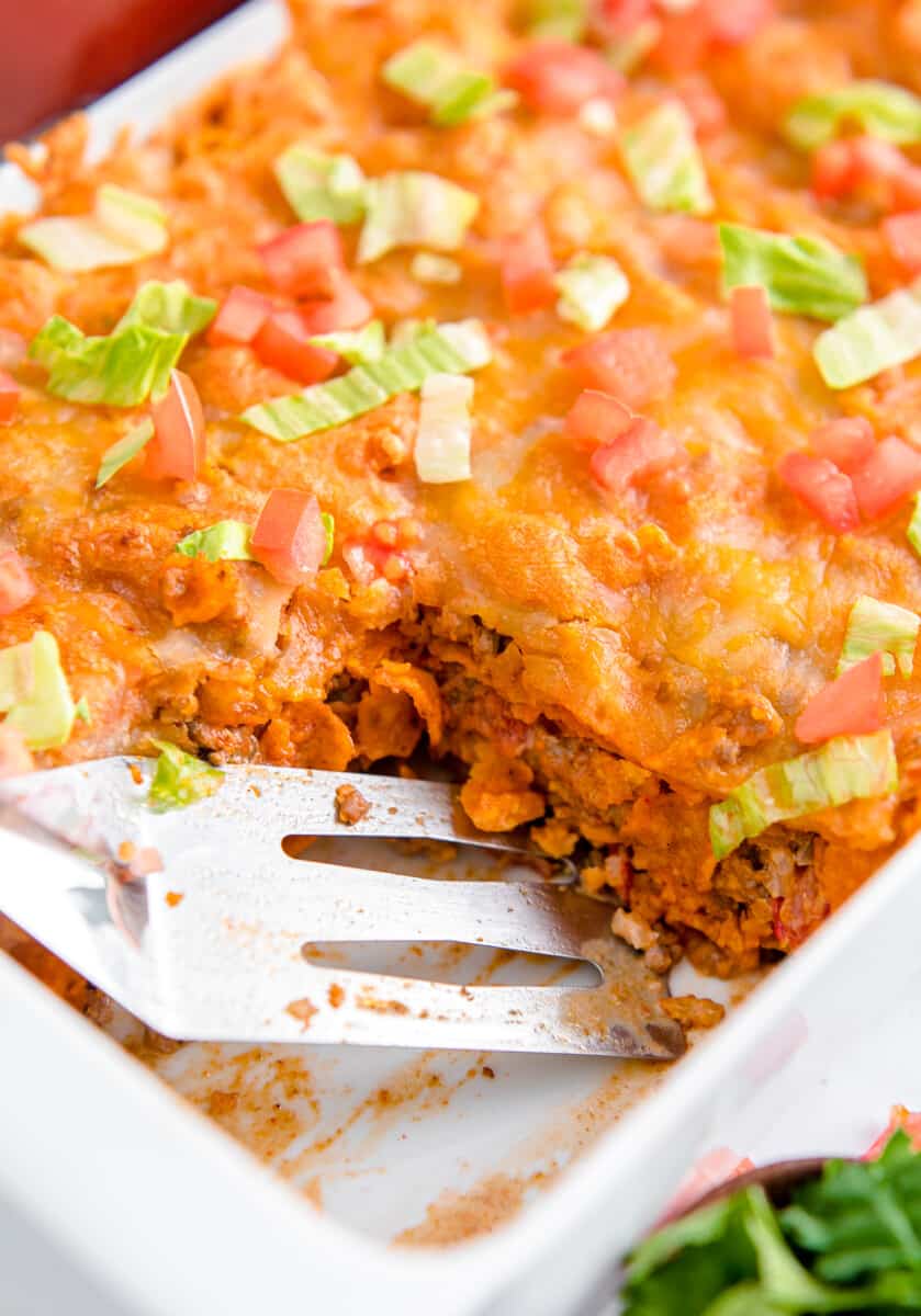 layered dorito casserole in baking dish
