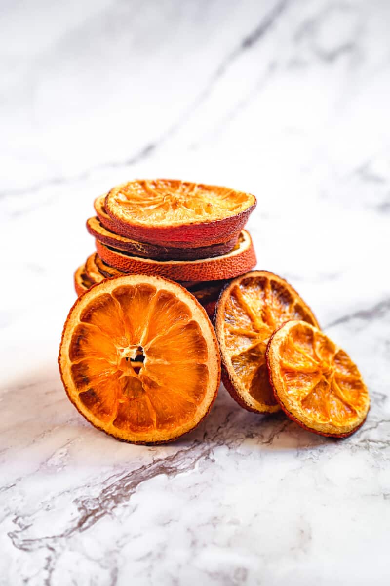 stacked dried orange slices on marble