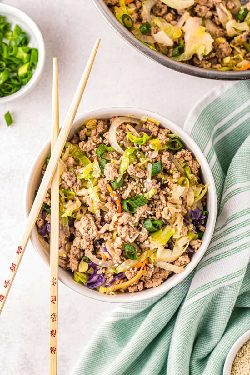 egg roll in a bowl with chopsticks