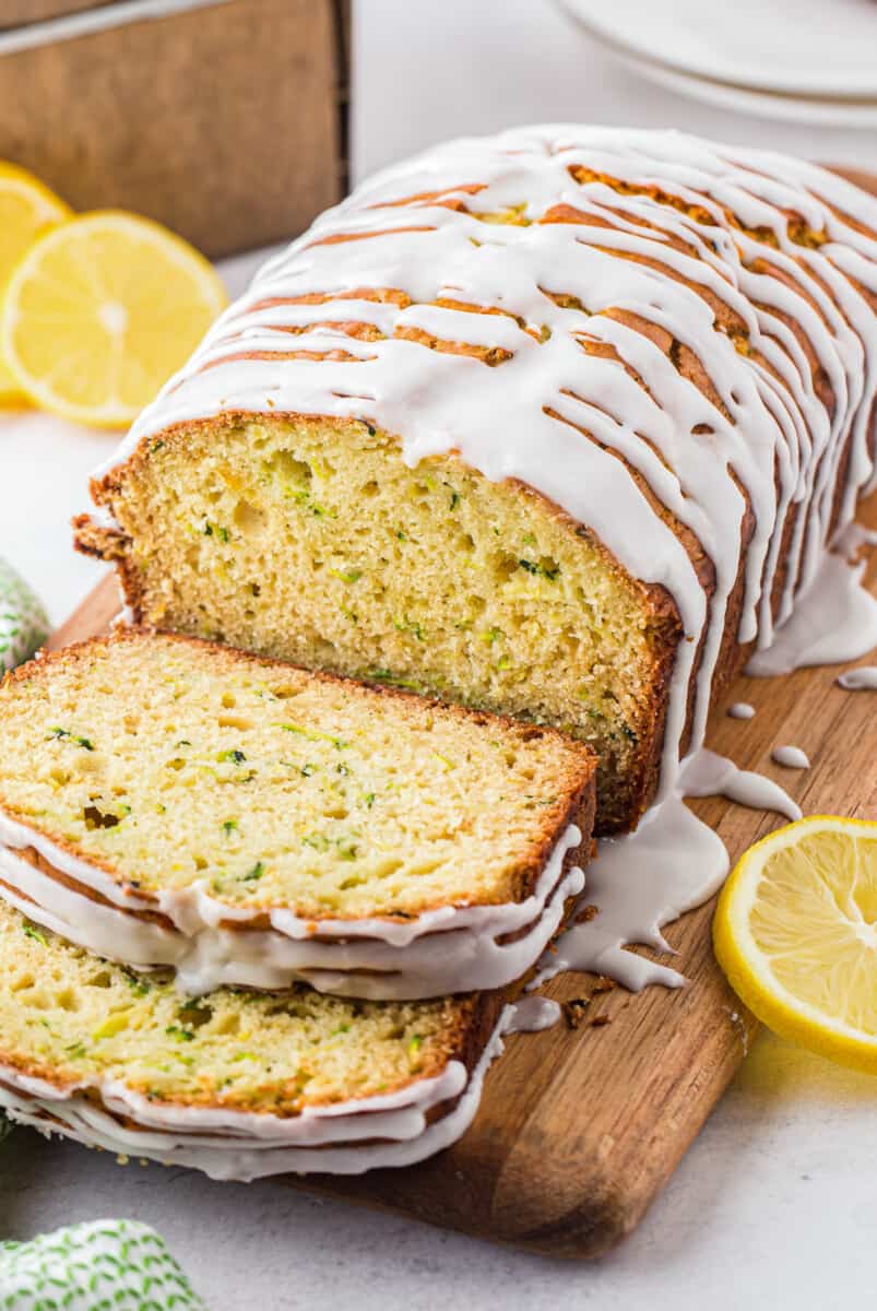 sliced lemon zucchini bread with icing