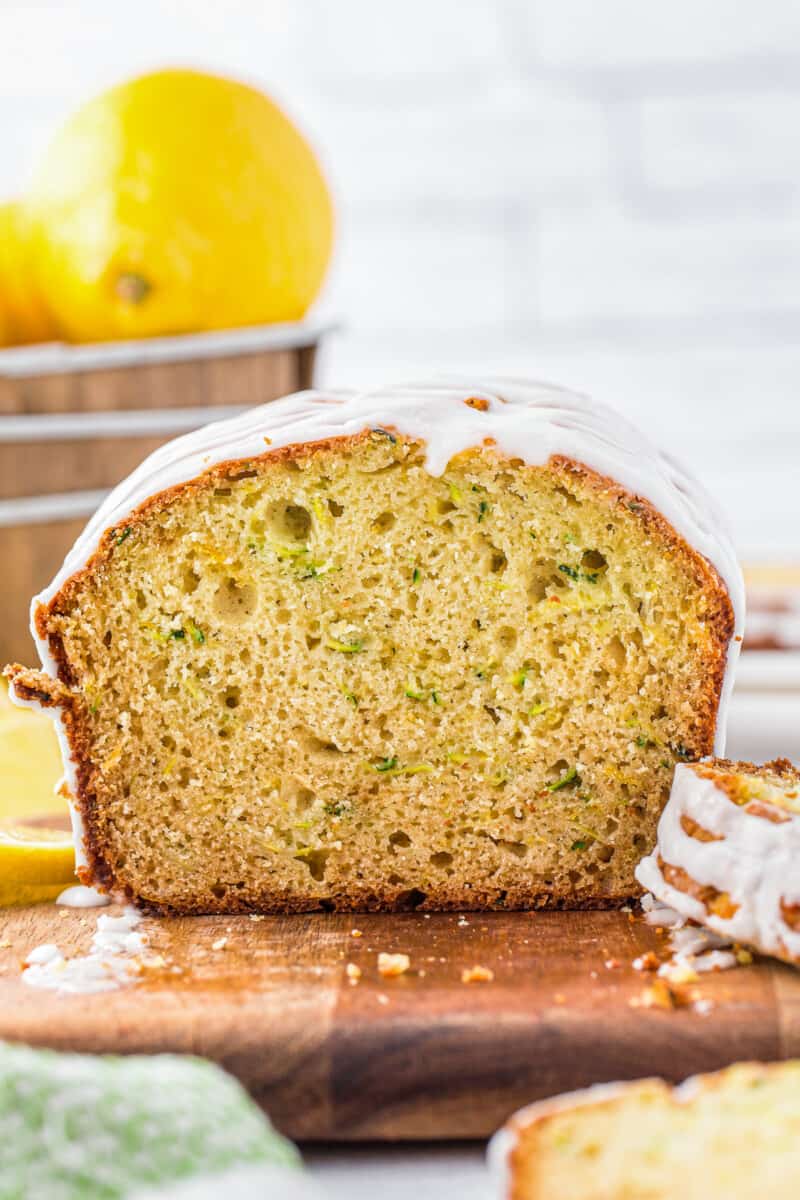 sliced lemon zucchini bread with icing