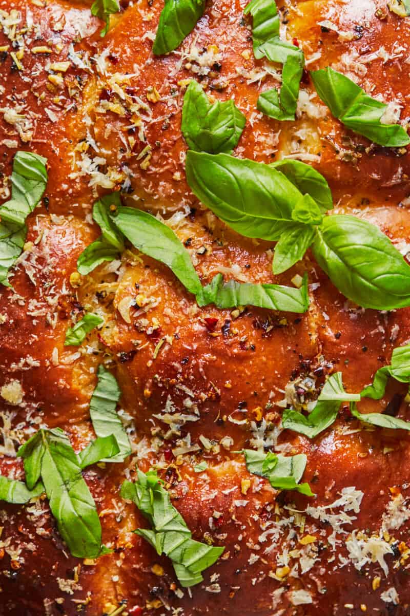 up close overhead of baked meatball sliders on sheet pan