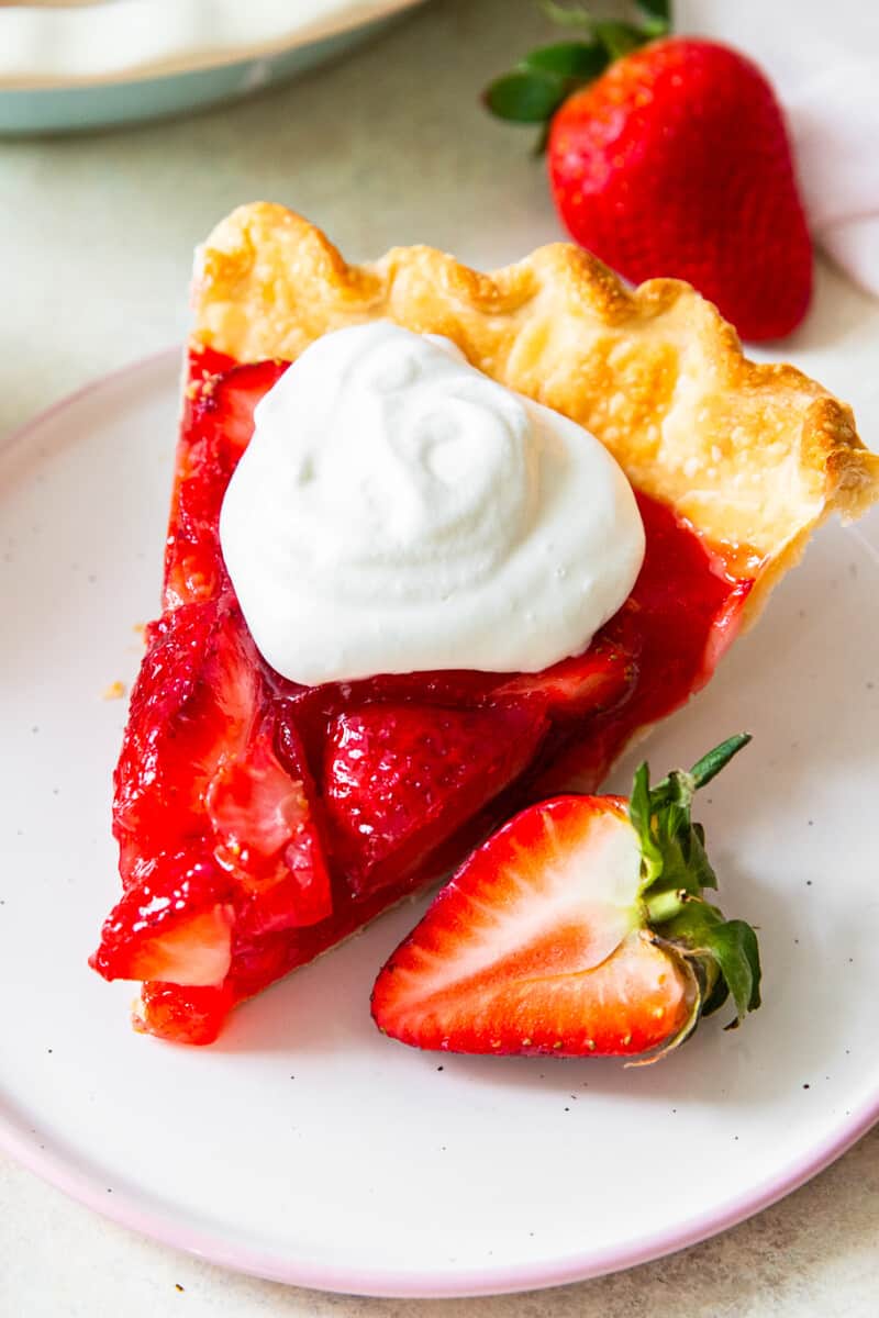 slice of strawberry jello pie with whipped cream