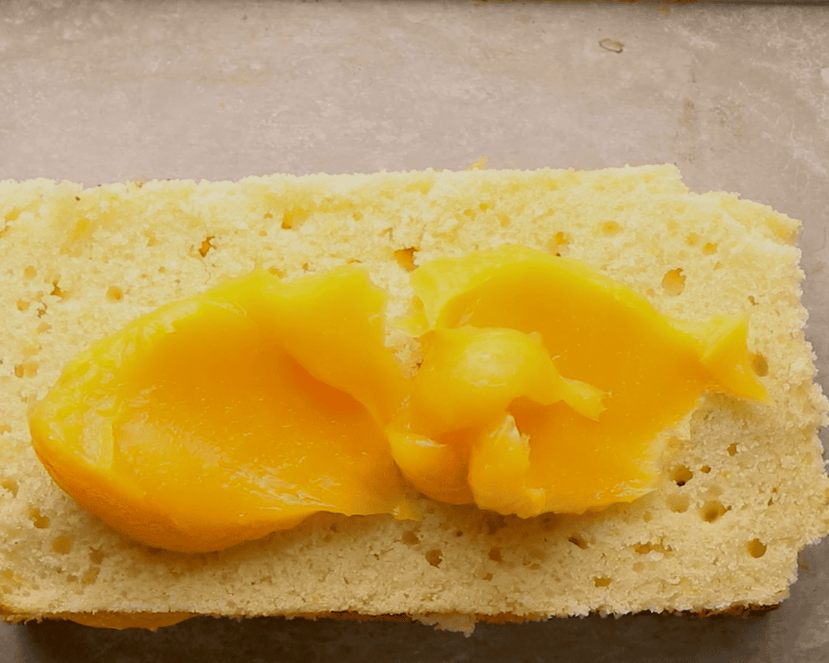 Layering the cake with lemon curd.