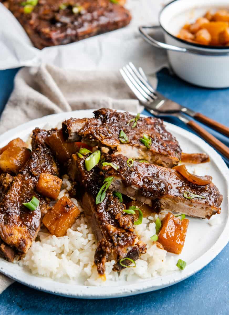 side shot plate of crockpot hawaiian ribs over rice