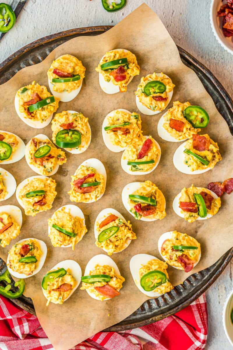 jalapeno popper deviled eggs on platter