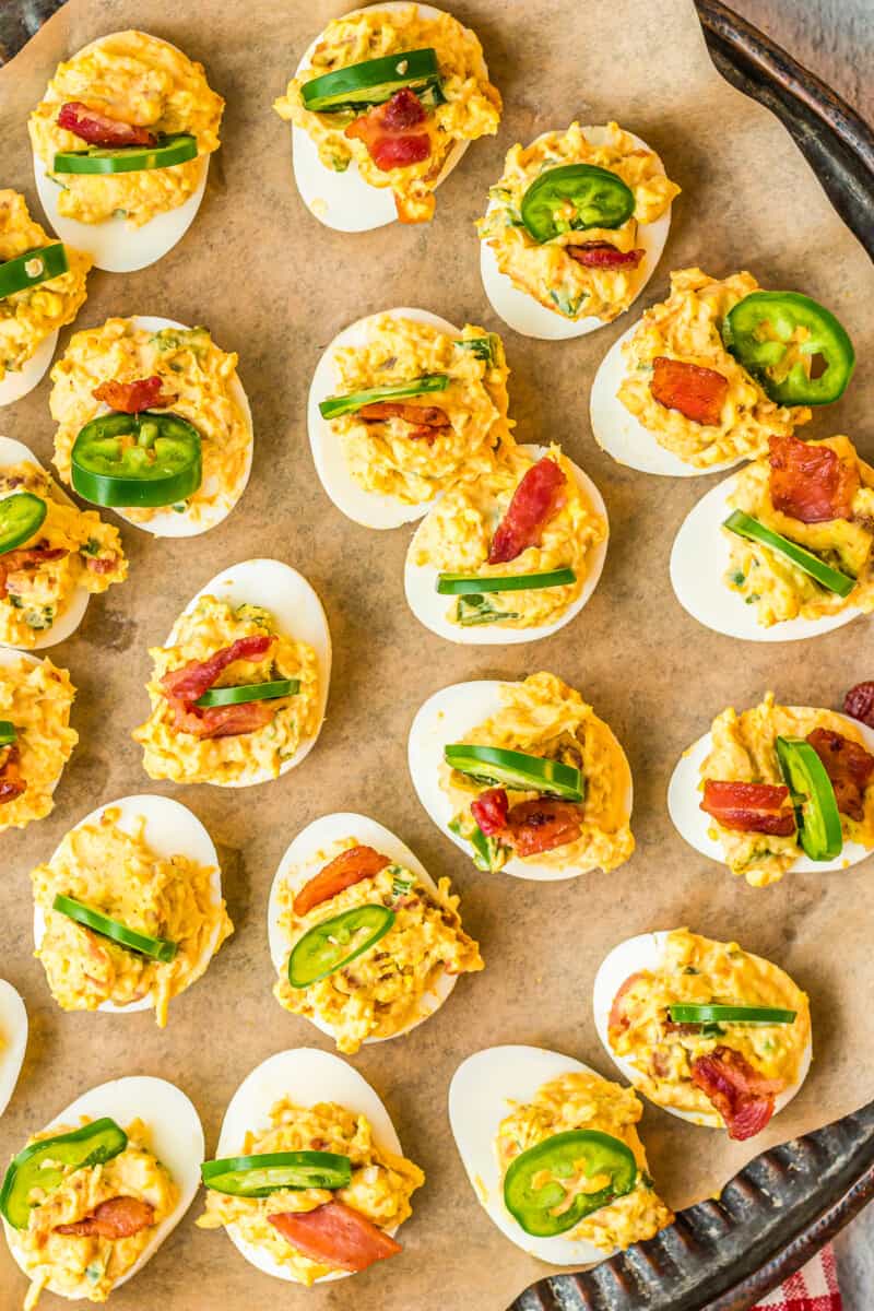 jalapeno popper deviled eggs on platter