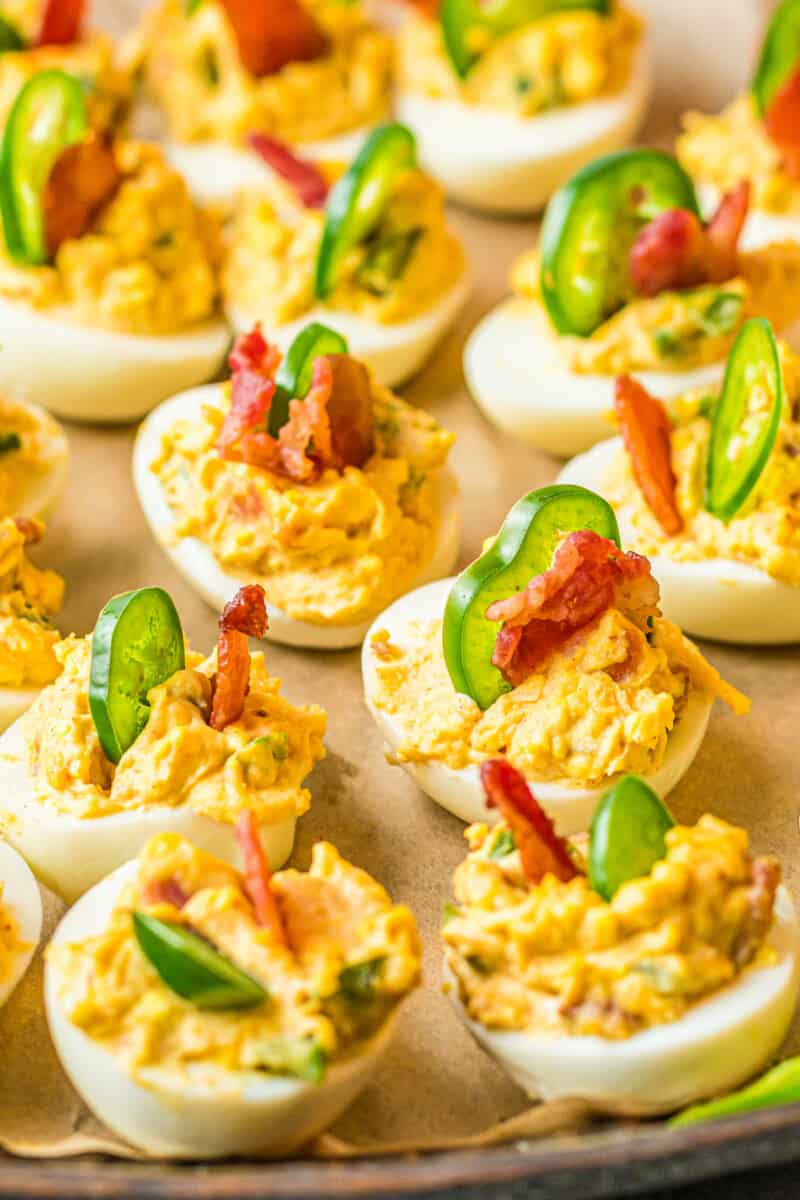 jalapeno popper deviled eggs on platter