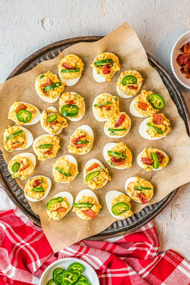 jalapeno popper deviled eggs on platter