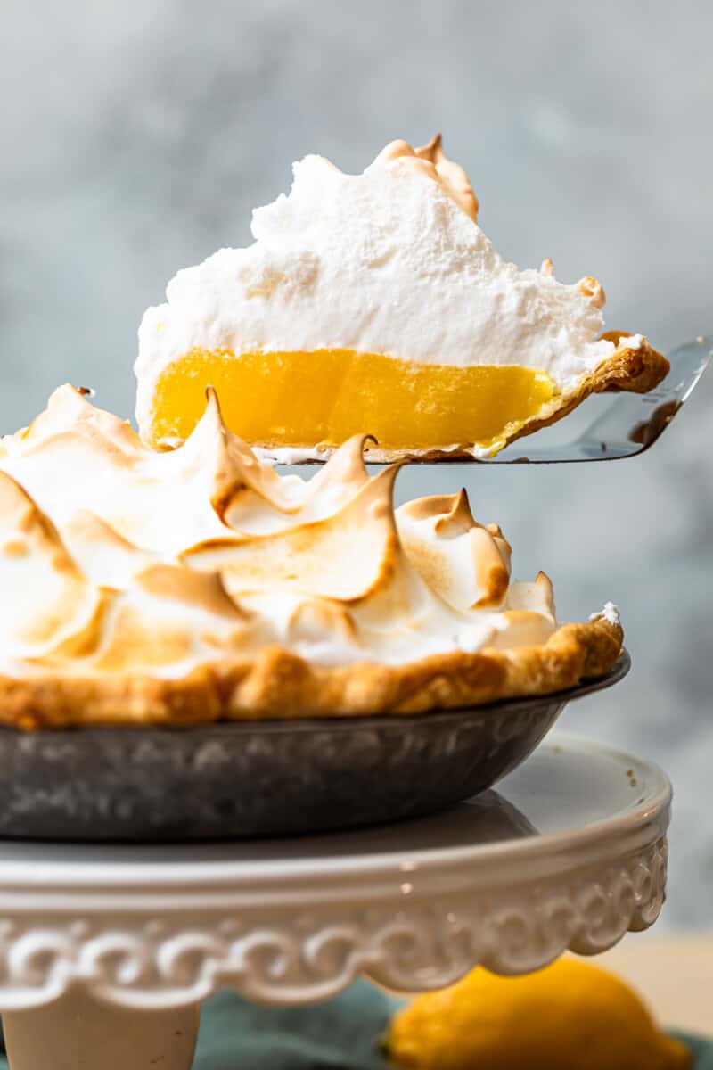 lifting up slice of lemon meringue pie