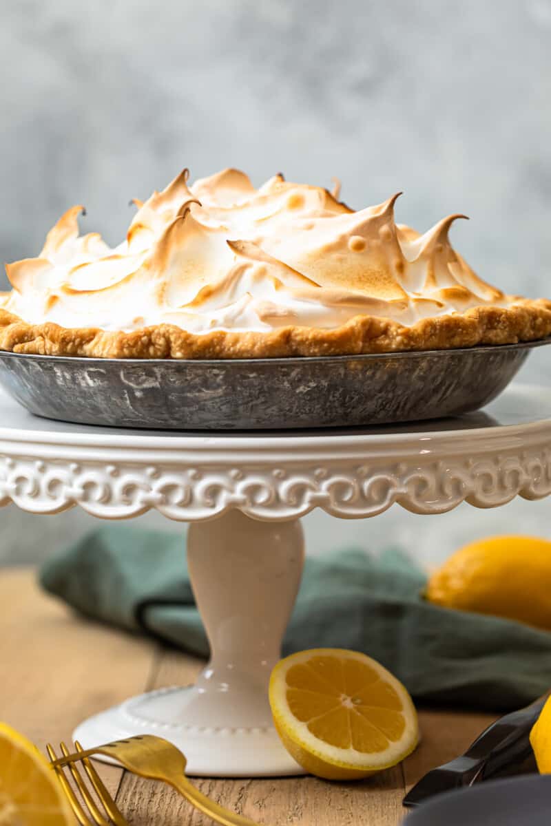 lemon meringue pie on cake stand