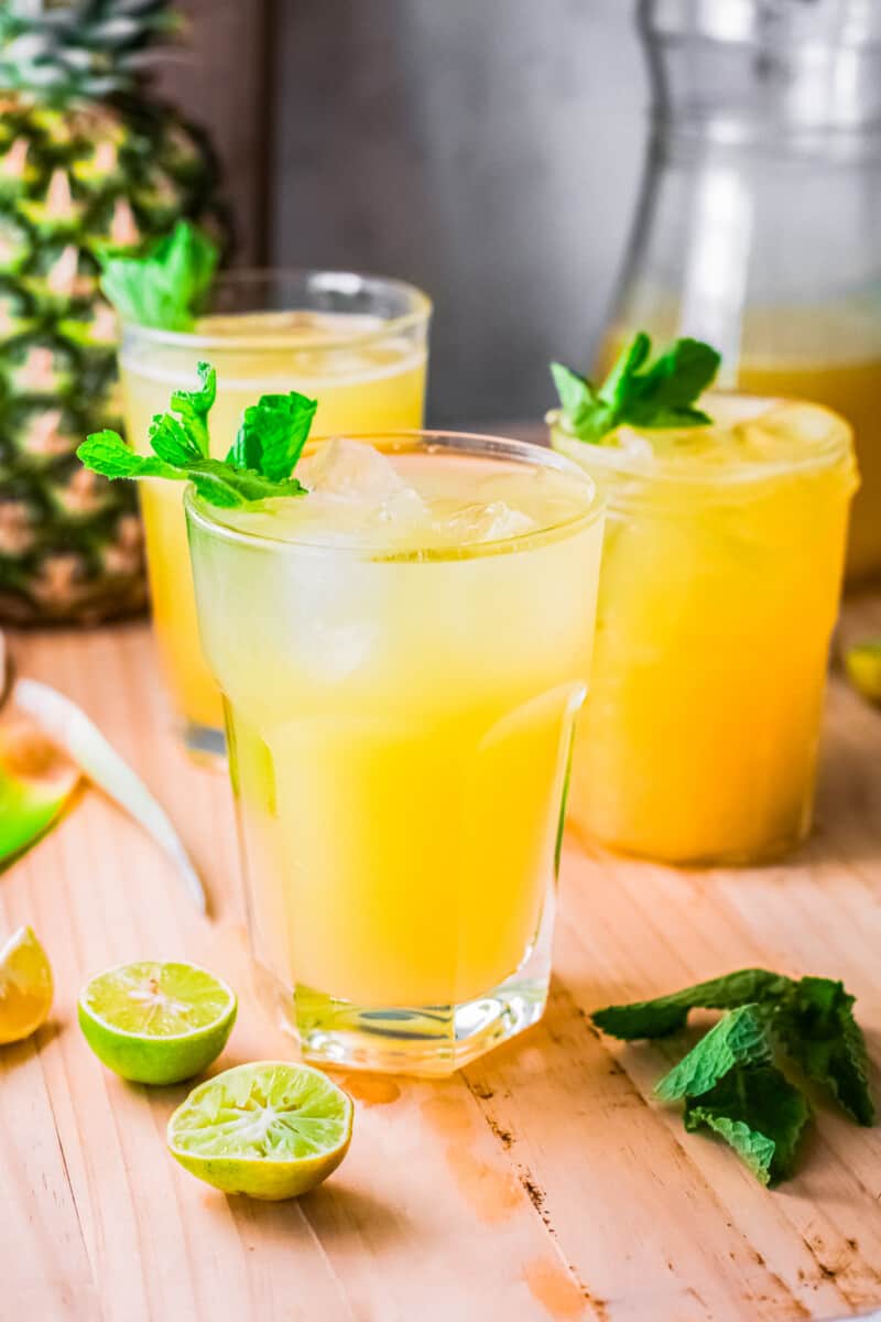 three glasses of pineapple agua fresca