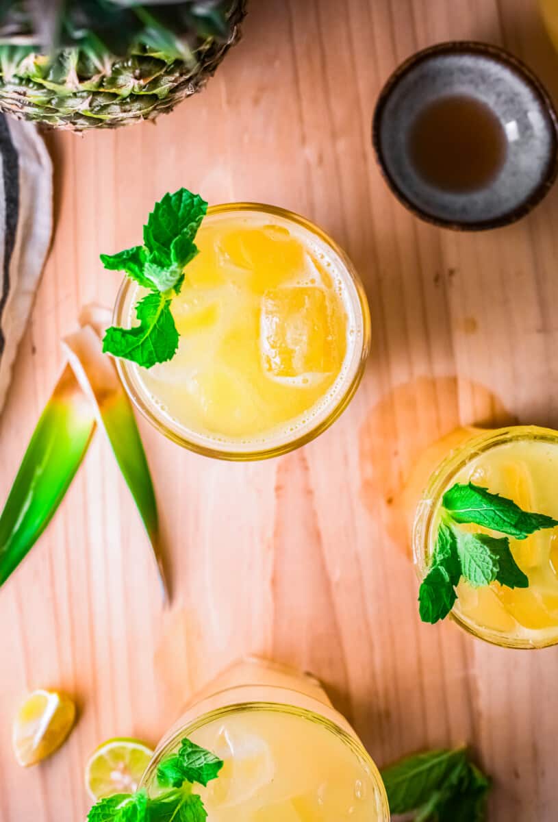 overhead image of pineapple agua fresca garnished with mint