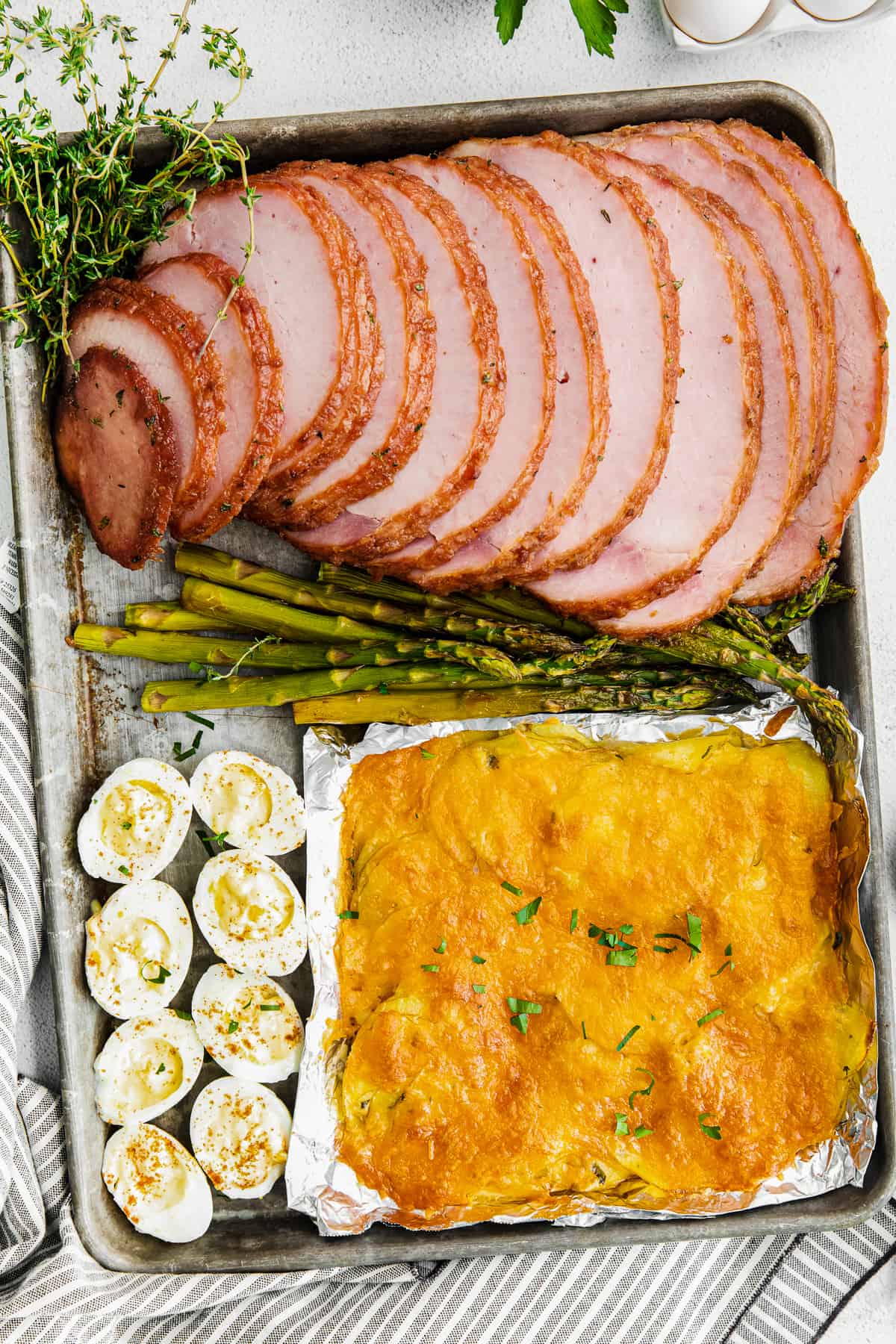 https://www.thecookierookie.com/wp-content/uploads/2021/03/sheet-pan-easter-dinner-ham.jpg