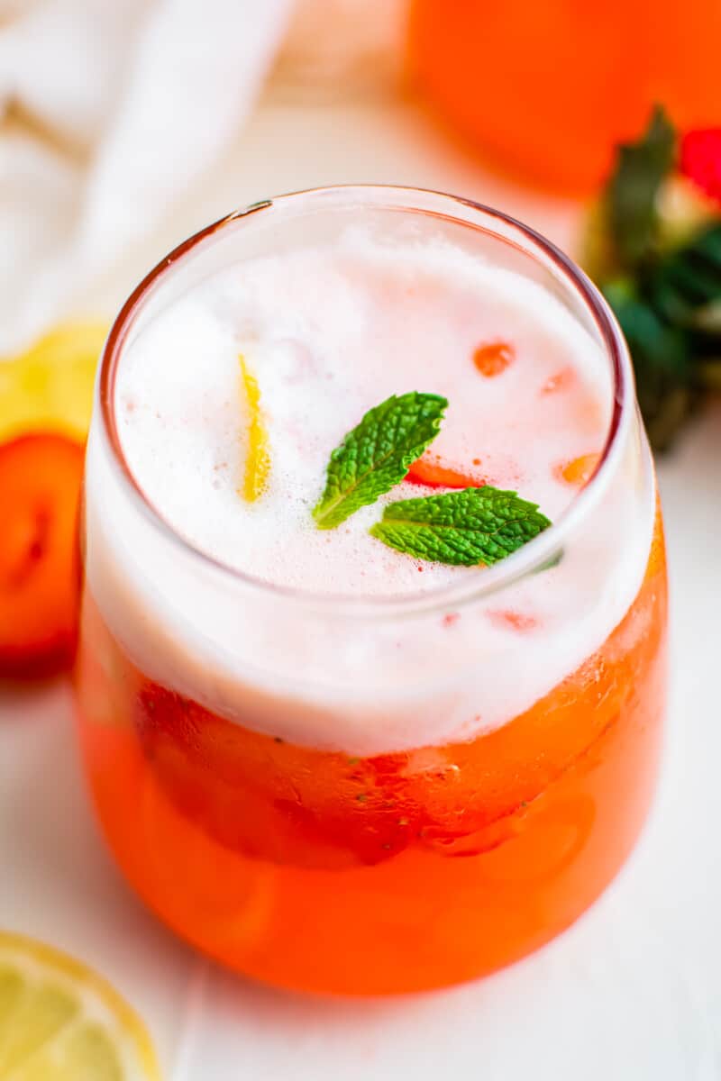 up tropical strawberry lemonade in glass