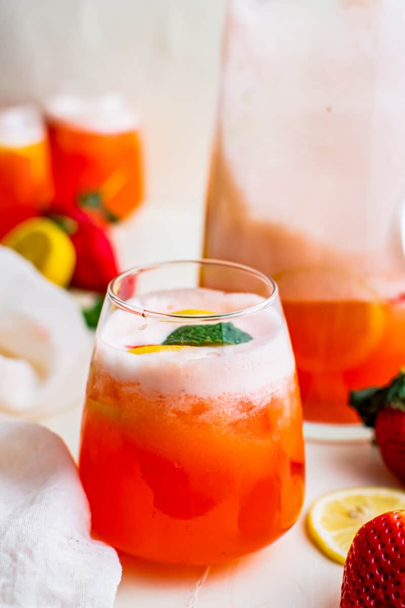 strawberry lemonade in glasses garnished with mint