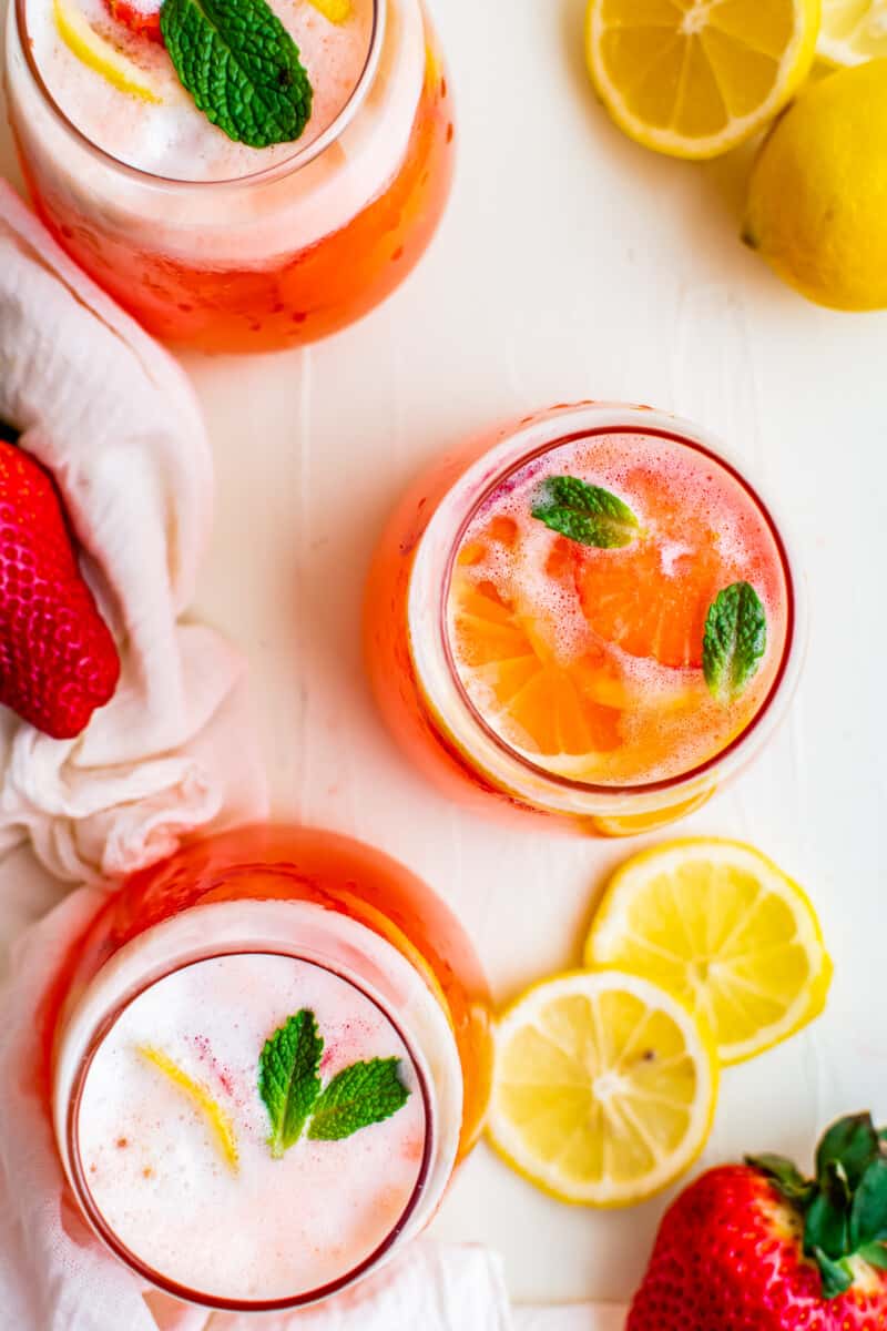 overhead 3 glasses of homemade strawberry lemonade