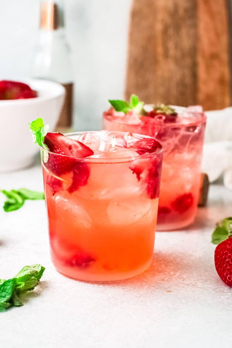 strawberry palomas garnished with strawberry slices