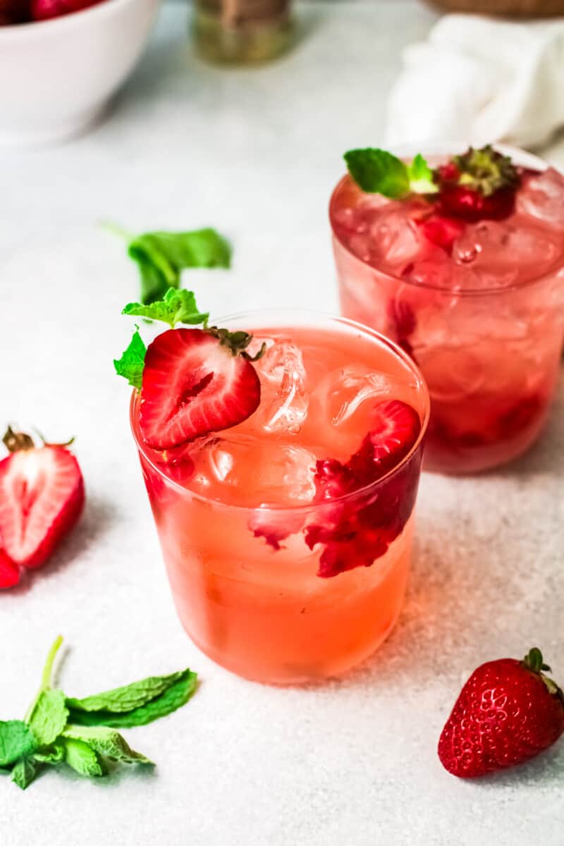 strawberry palomas garnished with strawberry slices