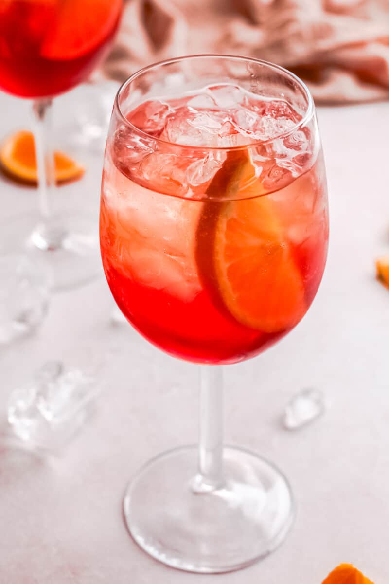 up tropical aperol spritz with orange slice